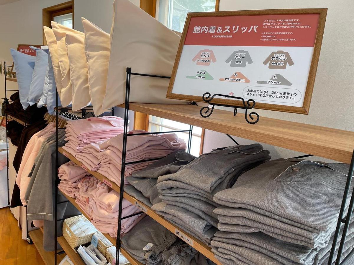 Log Hotel The Maple Lodge Iwamizawa Bagian luar foto