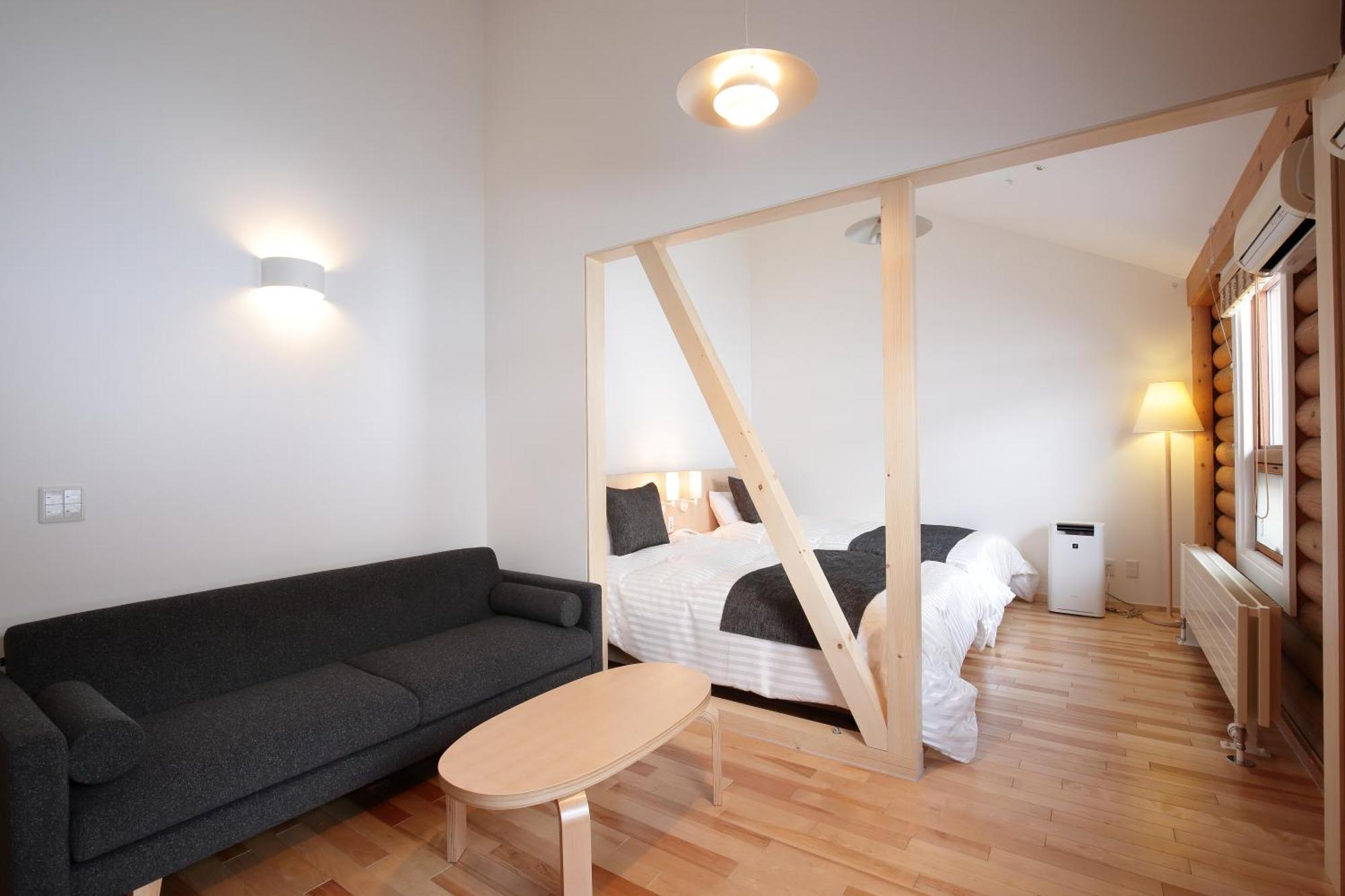 Log Hotel The Maple Lodge Iwamizawa Bagian luar foto